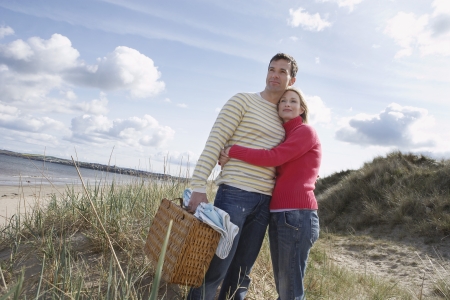 Couple embracing at beachの写真素材