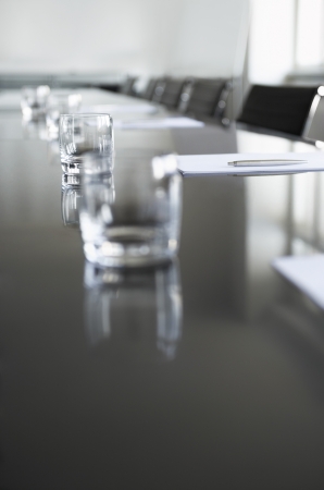 Empty glasses on conference room tableの写真素材