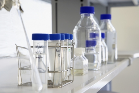 Test tubes on shelf in laboratoryの写真素材