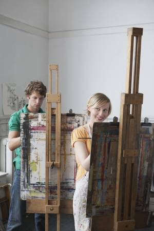 Two artists painting in studioの写真素材