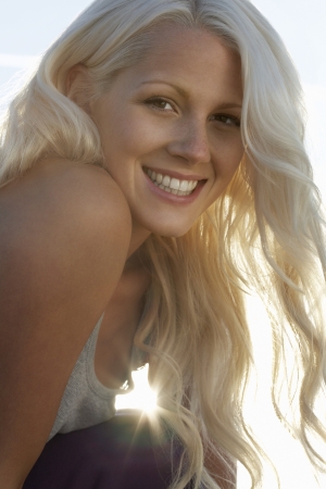 Young woman smiling close up portraitの写真素材