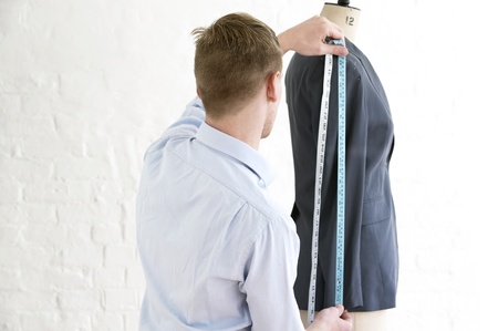 Tailor measuring jacket sleeve back view