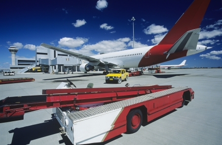 Cart near aeroplane at airport Perth Australiaの写真素材