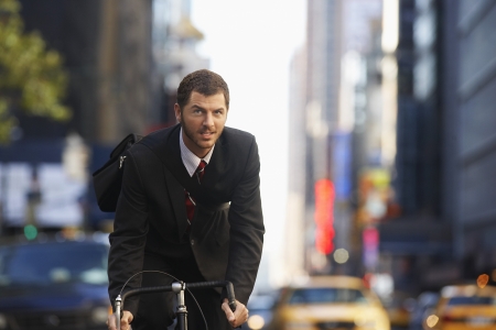 Man riding bicycle on street