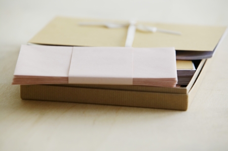 Envelopes and paper stationery elevated view studio shotの写真素材