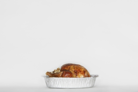 Roasted turkey in tinfoil panの写真素材