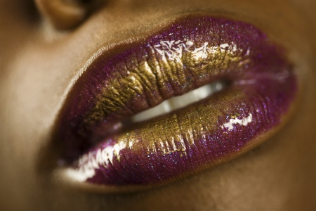 Young Woman with Purple and Gold Lipstickの写真素材