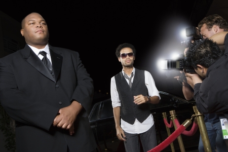 Male celebrity arriving at media eventの写真素材