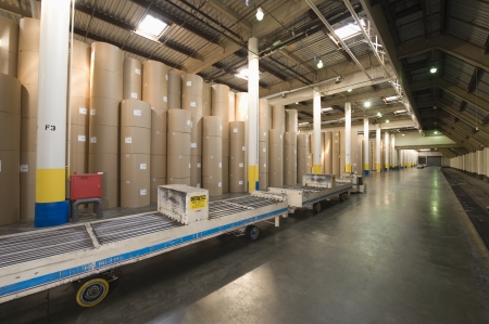 Huge rolls of paper in newspaper factoryの写真素材