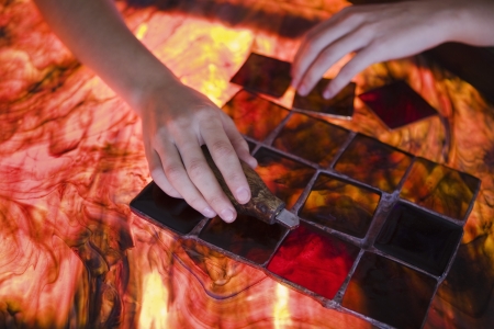 Artist producing textiles close-up
