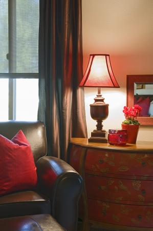 leather sofa with lit lamp in Palm Springs home interiorの写真素材
