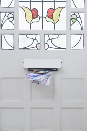 Letterbox and stained glass front doorの写真素材