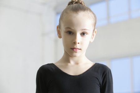 Young girl in dance leotard with hair backの写真素材