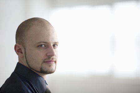 Portrait of young businessman smilingの写真素材
