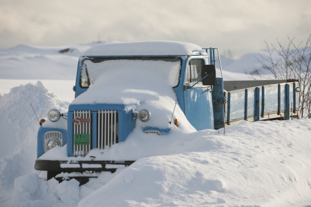 Truck is snowed in Flakstadoya Loftofen Norwayの写真素材