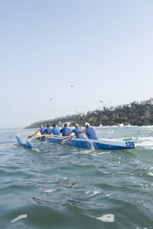 Outrigger canoeing team in trainingの写真素材