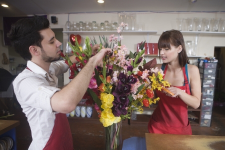 Floriste work on flower arrangementの写真素材