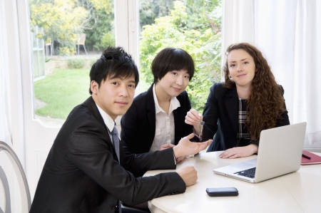 Group portrait of three businesspeopleの写真素材