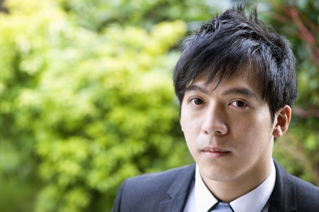 Close-up portrait of confident businessmanの写真素材