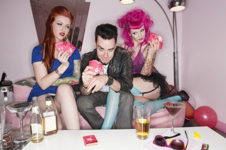 Funky people playing cardsの写真素材