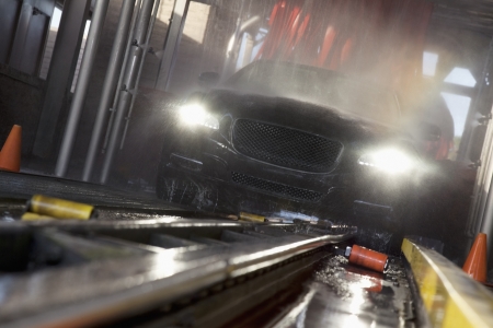 Front view of car passing through car wash processの写真素材