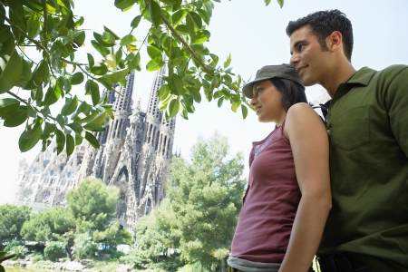 Young couple enjoying view in Barcelona portraitの写真素材