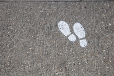 Wet footprints on the concrete floorの写真素材
