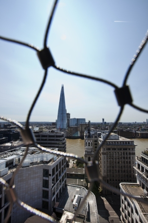 View of the Shard, London behind wire netの写真素材