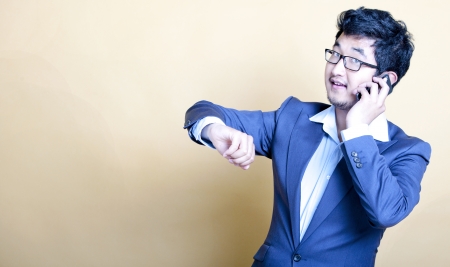 Stylish Asian man on the telephone