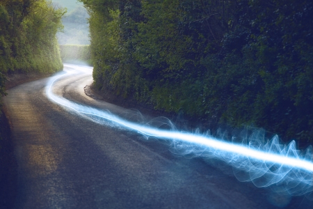 Fiber optic cable running above ground in the British Countrysideの写真素材