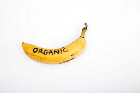 Organic banana against white backgroundの写真素材