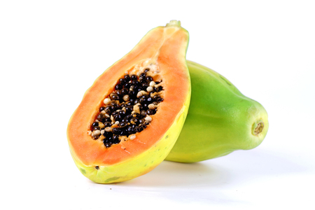 Halved papaya on white backgroundの写真素材