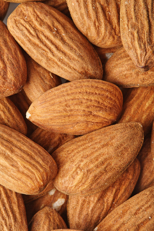 Almonds on white background - close-upの写真素材