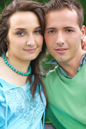 Portrait of young couple smilingの写真素材