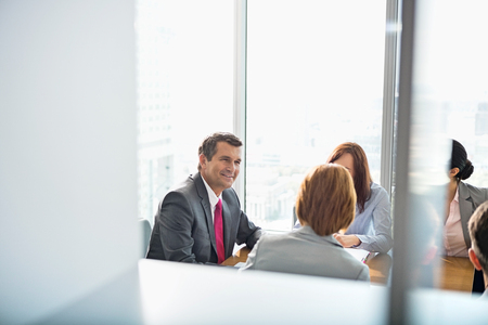 Businesspeople in conference roomの写真素材
