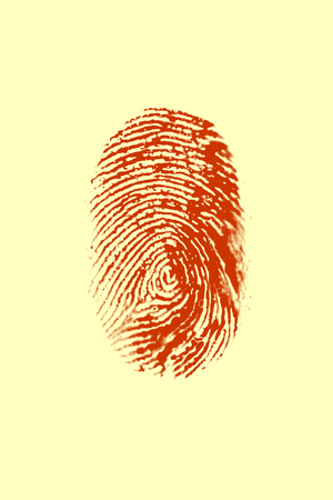 Red Fingerprint on yellow backgroundの写真素材