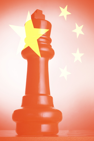 Chess pieces against Chinese Flagの写真素材