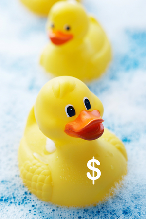 Row of Rubber Ducks in Bubble Bathの写真素材
