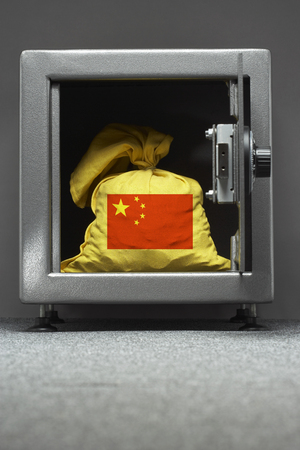 China Flag on bag of money in safeの写真素材