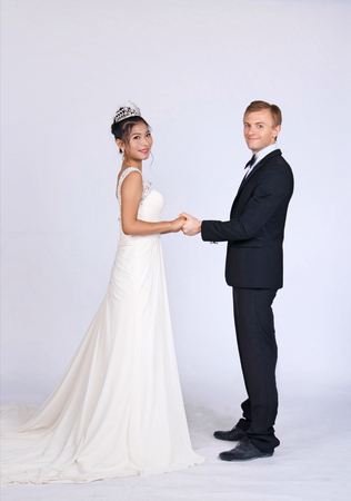 Mixed Race Bride and Groom in Studioの写真素材