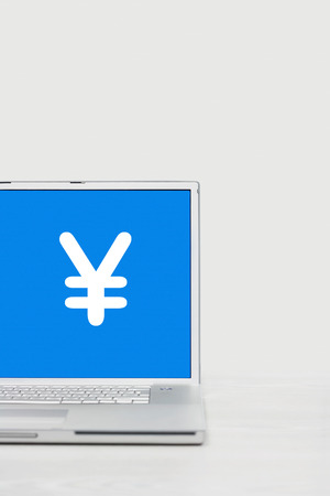 Laptop with Yen symbolの写真素材