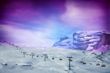 Ski lift with amazing purple skyの写真素材