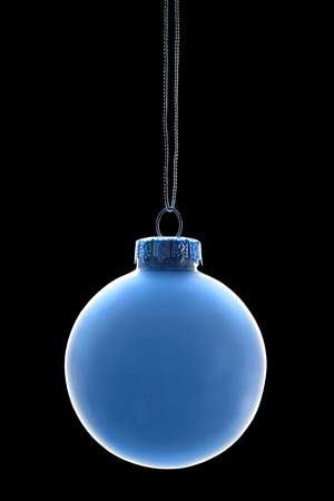Blue bauble on black backgroundの写真素材