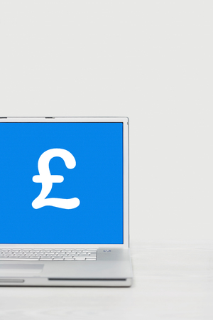 Laptop with pound symbolの写真素材