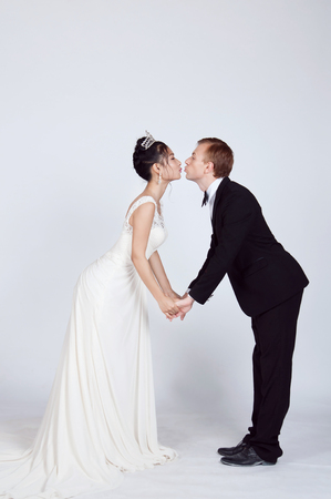 Mixed Race Bride and Groom in Studioの写真素材