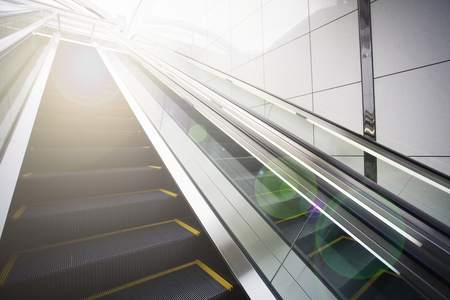 Escalators with lens flareの写真素材