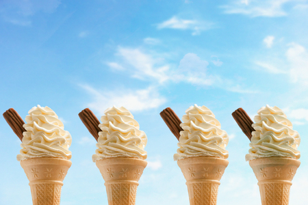 Four Ice Cream Cones against Skyの写真素材