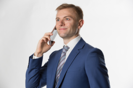 Businessman making call on cellphoneの写真素材
