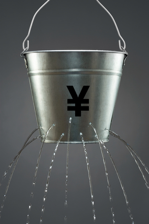 Leaky Yen Bucketの写真素材