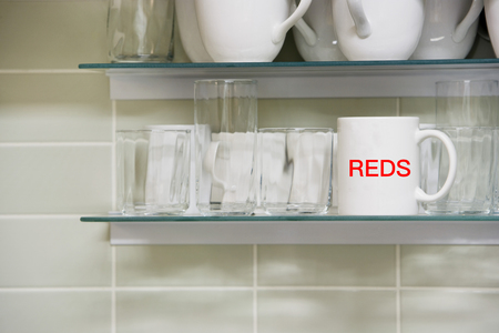 Mug on shelfの写真素材